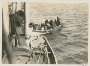 Image of Nascopies in boat along side
